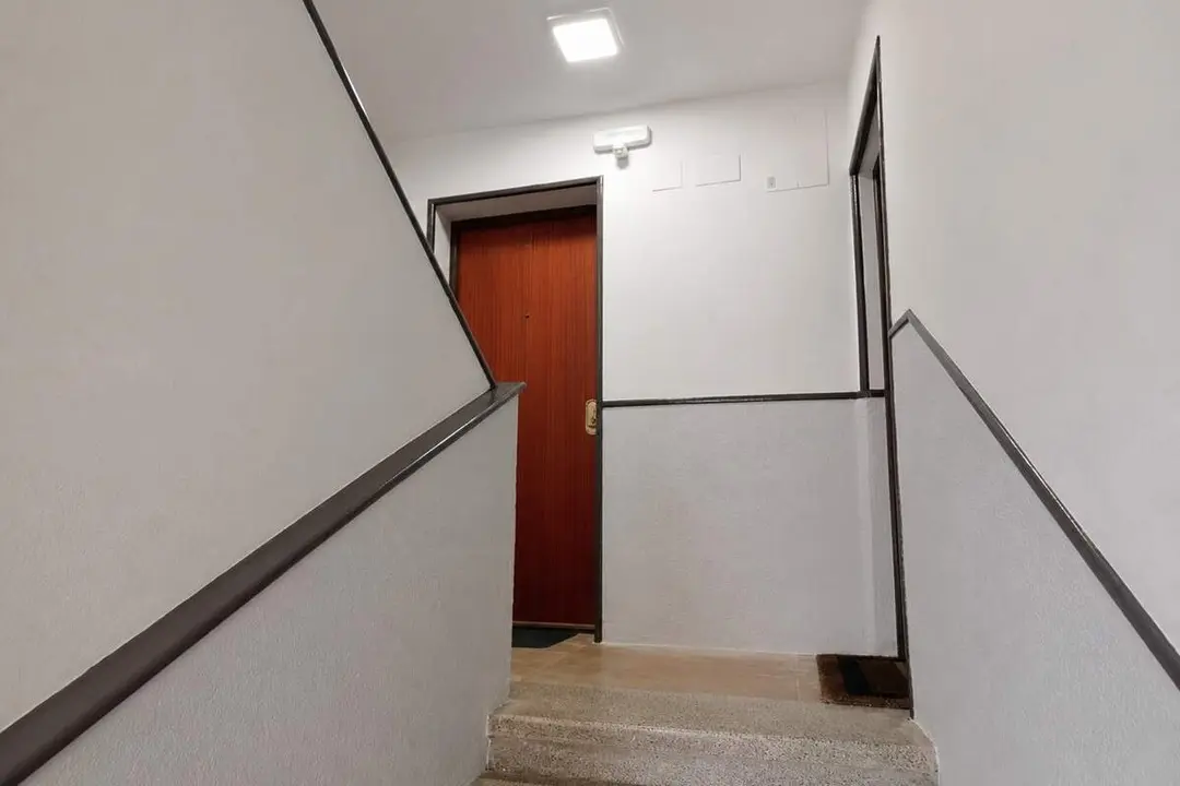 Rellano edificio vecinos viviendas Valladolid incidente