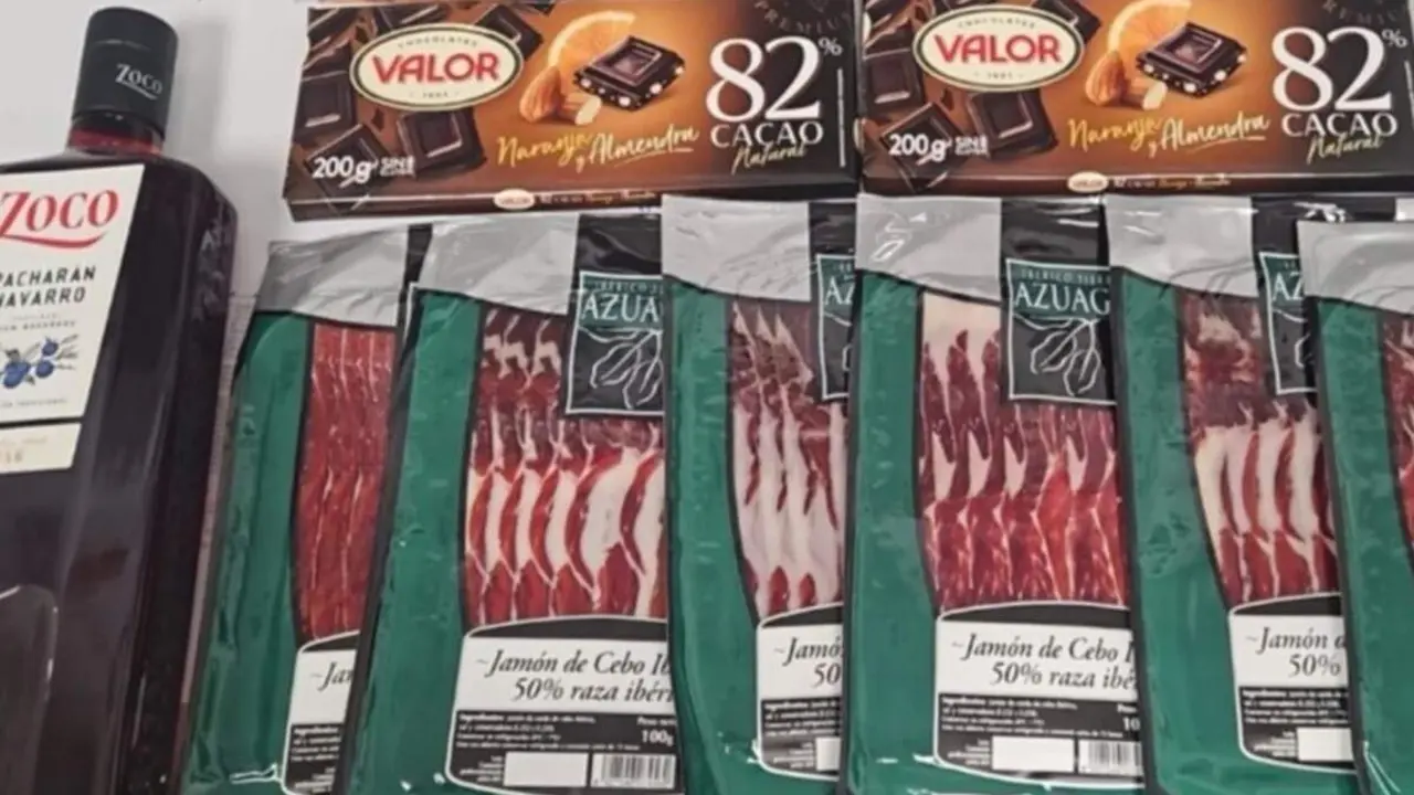 Robo paquetes jamon tabletas chocolate y botella pacharan supermercado Las Delicias Valladolid