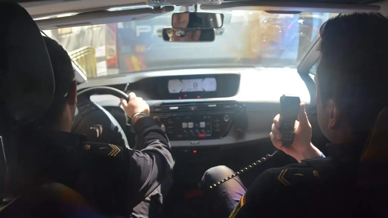 Agentes Policia Nacional de Valladolid interior coche patrulla sucesos fuga