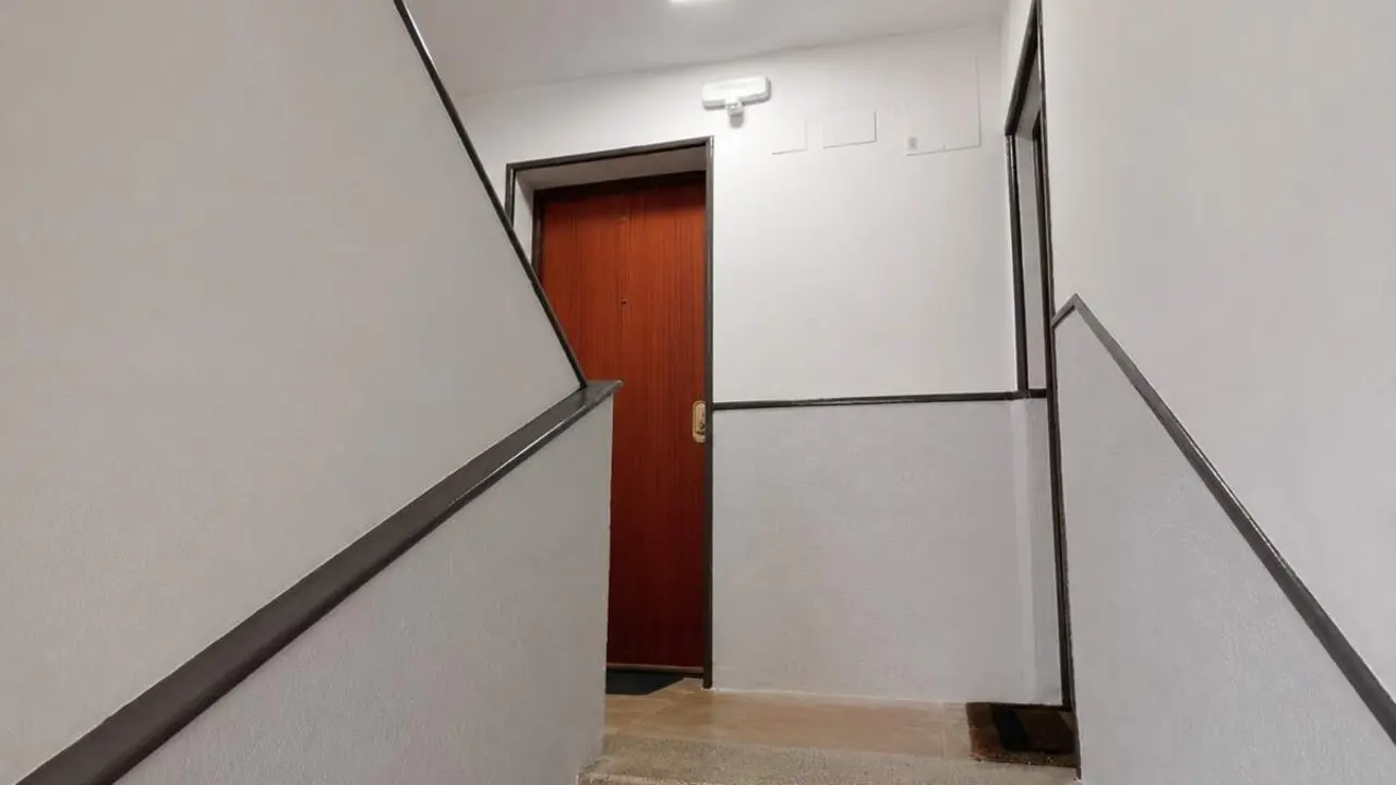Rellano edificio vecinos viviendas Valladolid incidente